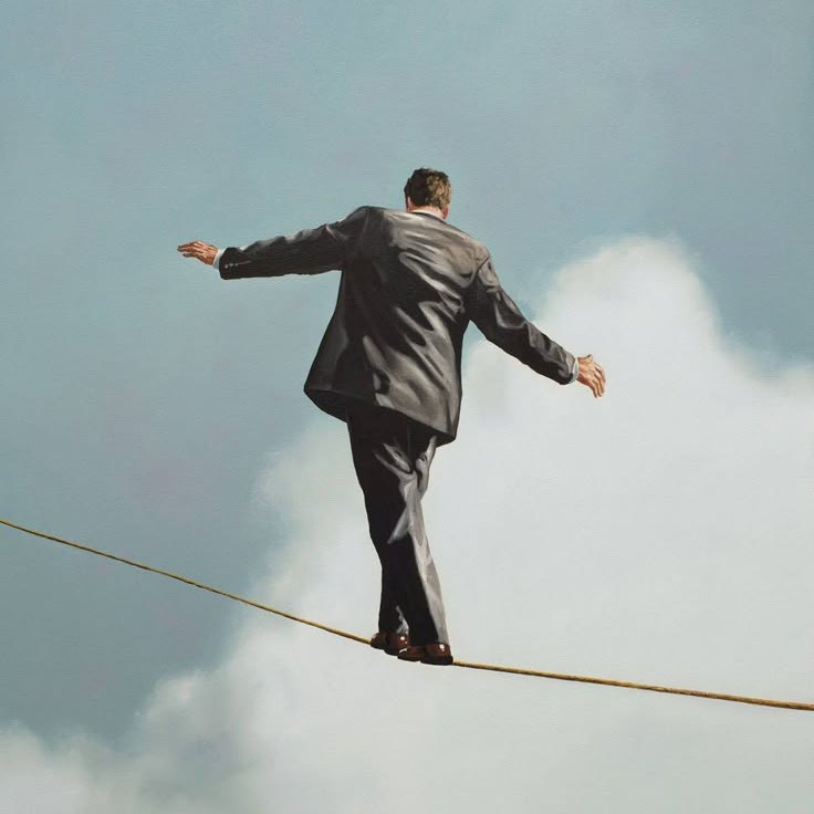 Photograph of a man in a suit balancing on a tightrope high above the clouds, arms outstretched