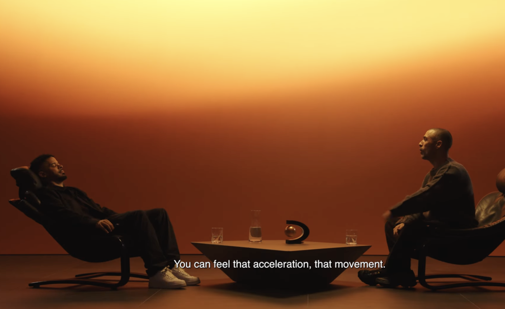 two people sat in hypnosis session